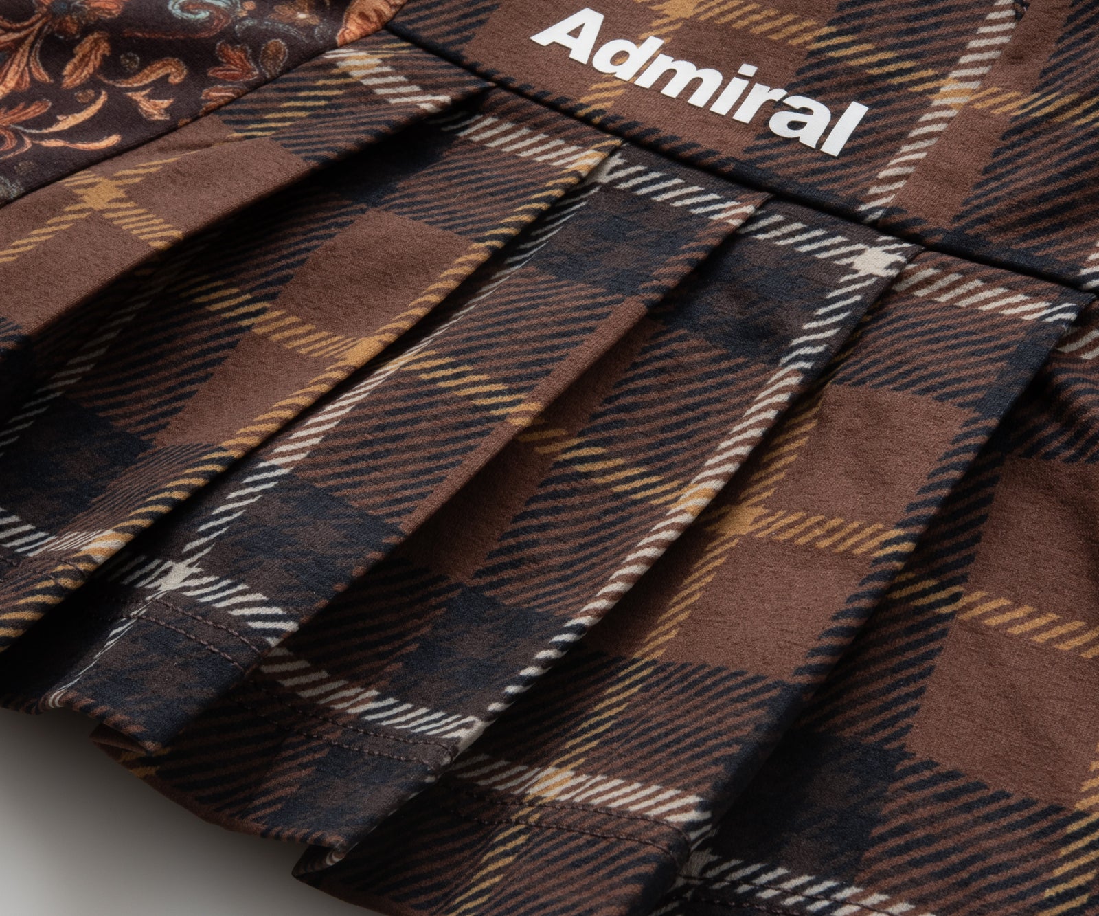 サイドプリーツアソートグラフィックスコート ATLA551 – ADMIRAL