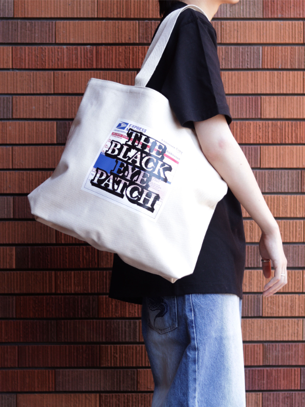 BLACK EYE PATCH PRIORITY LABEL TOTE - BOOMERANG,Lola,Thingsly公式