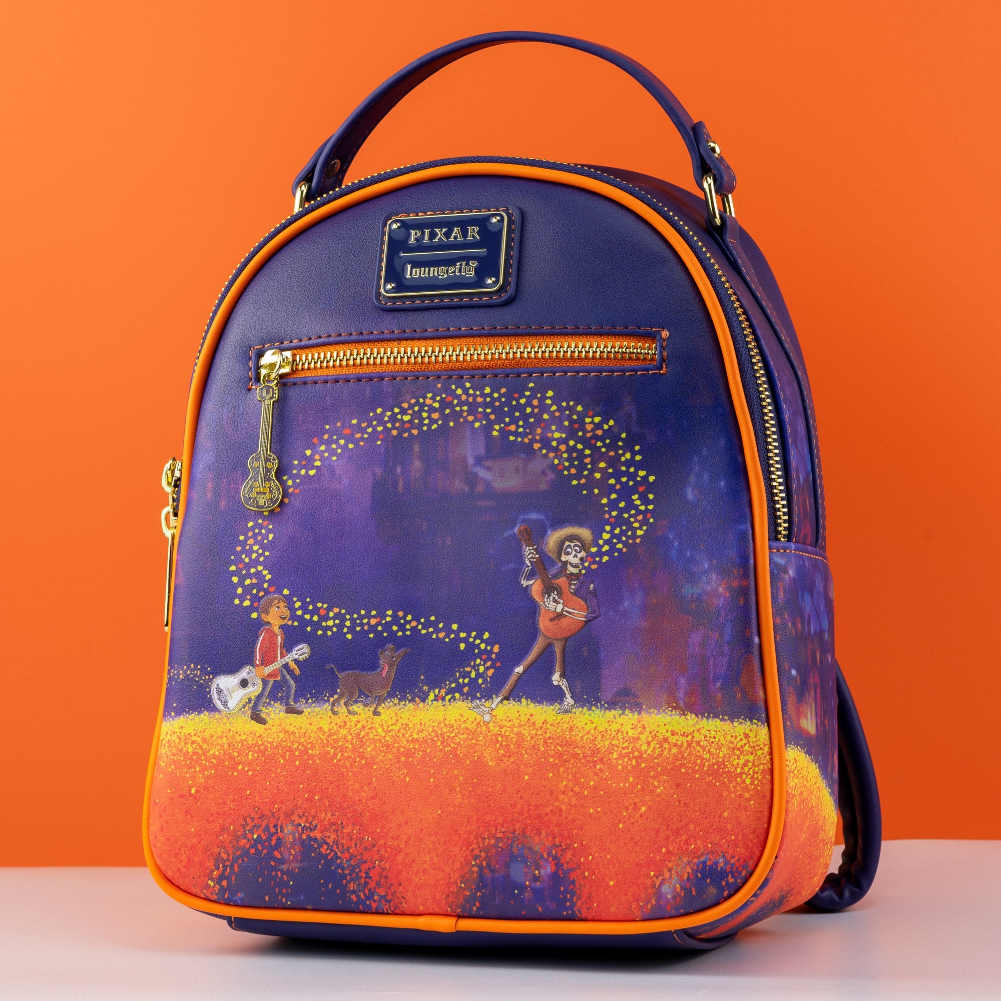 Loungefly x Pixar Coco Marigold Bridge Mini Backpack – GeekCore