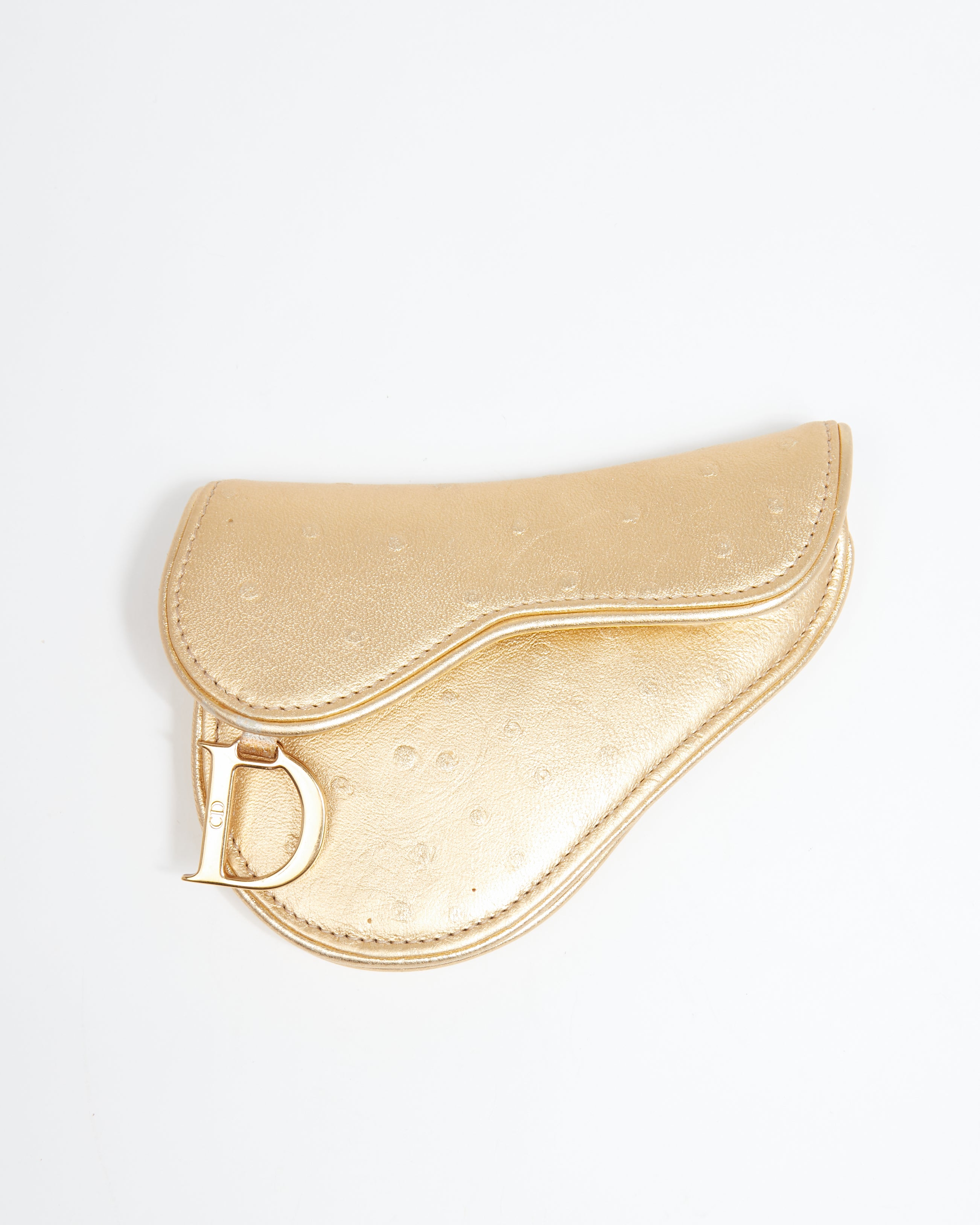 Explore a Dior Gold Embossed Leather Saddle Coin Pouch