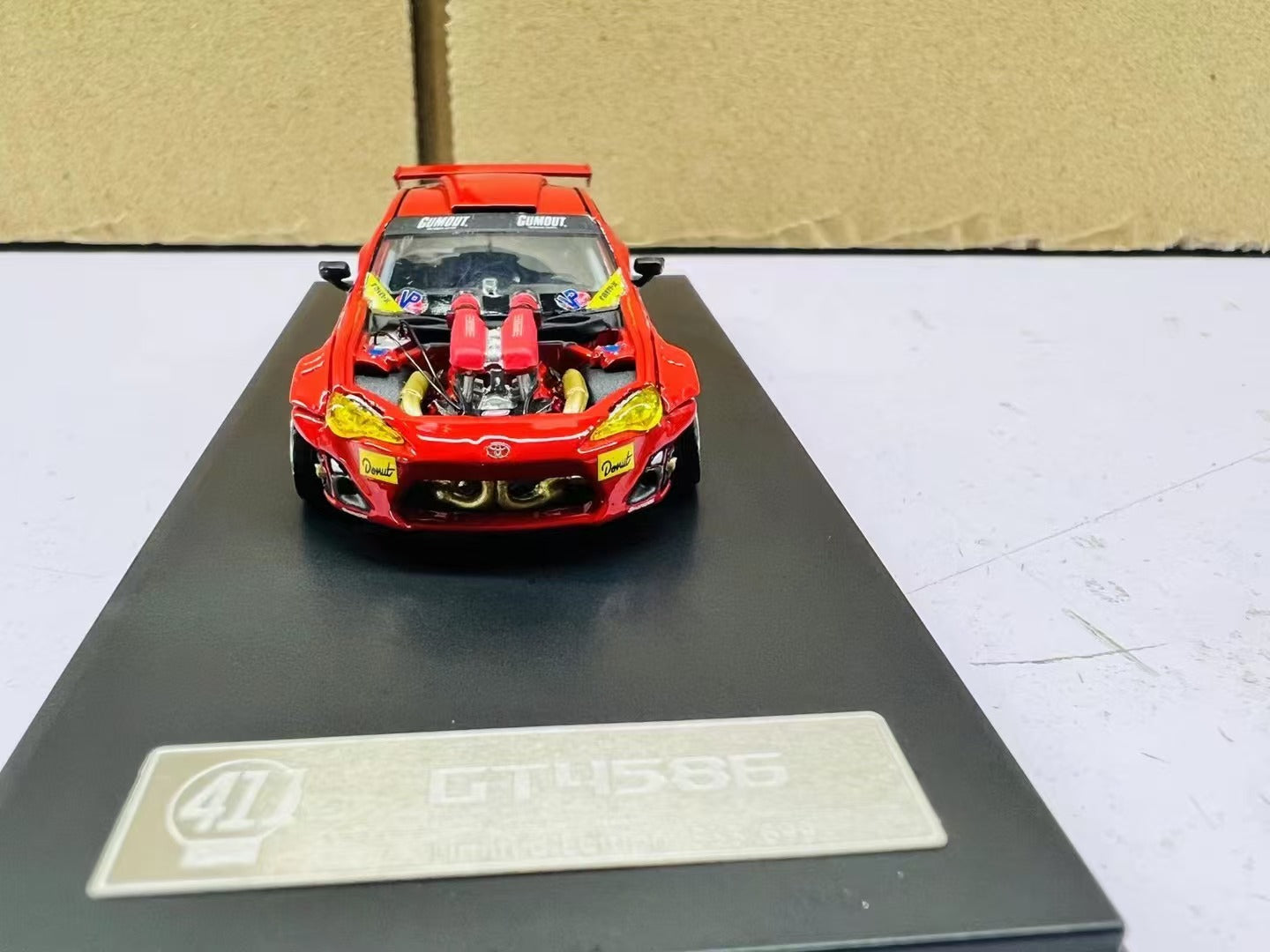 DCM 1:64 GT4586 Red Diecast – Horizon Diecast