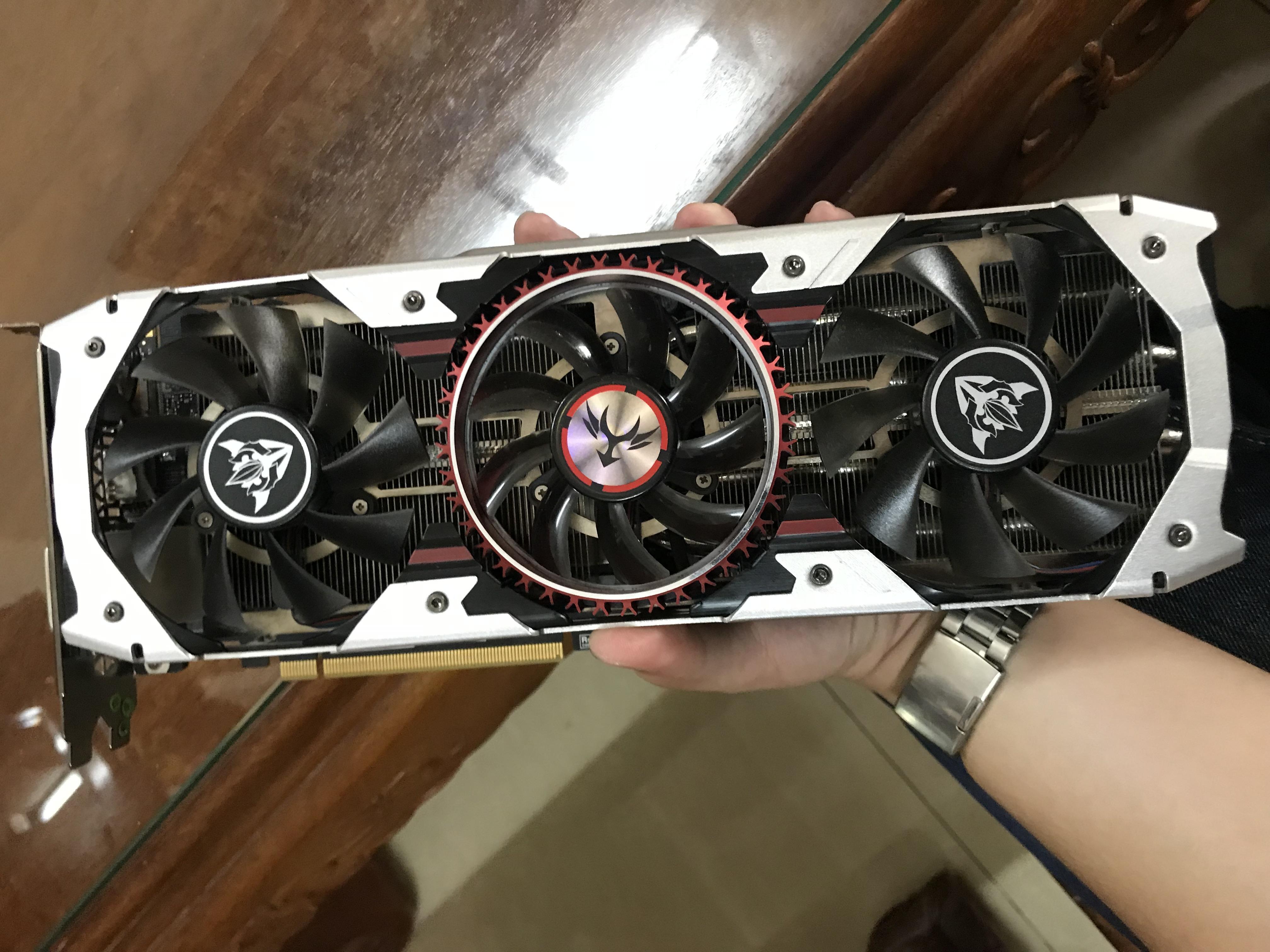 GTX 1080 Ti by Colorful. Ugly as hell, but I can get it new for