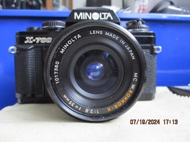 A minolta MC W. ROKKOR-X 35mm f2.8 lens appears - YouTube