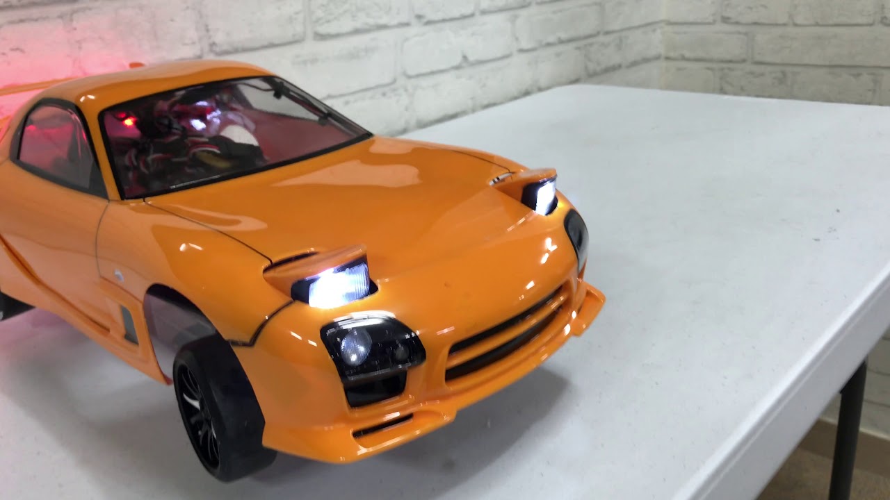 ABC HOBBY RX7 drift headlights flip up - YouTube
