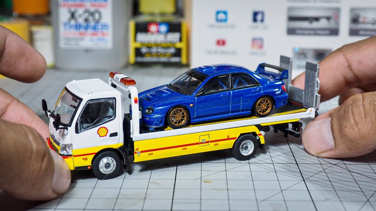 Unboxing TINY Shell flatbed tow truck Isuzu N series 1/64 scale