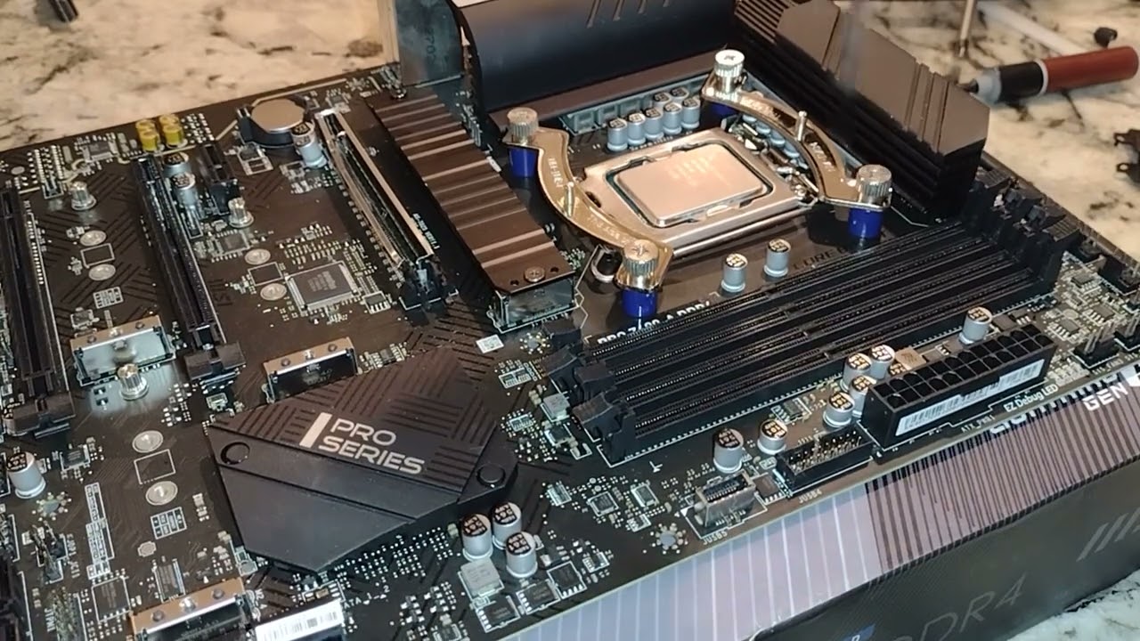 I9-12900 install into MSI Pro Z690 wifi LGA 1700 motherboard - YouTube