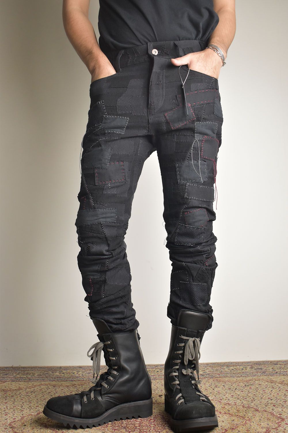 D.HYGEN - Hand Patchwork Crust Jacquard Overlock Twist Curve Pants