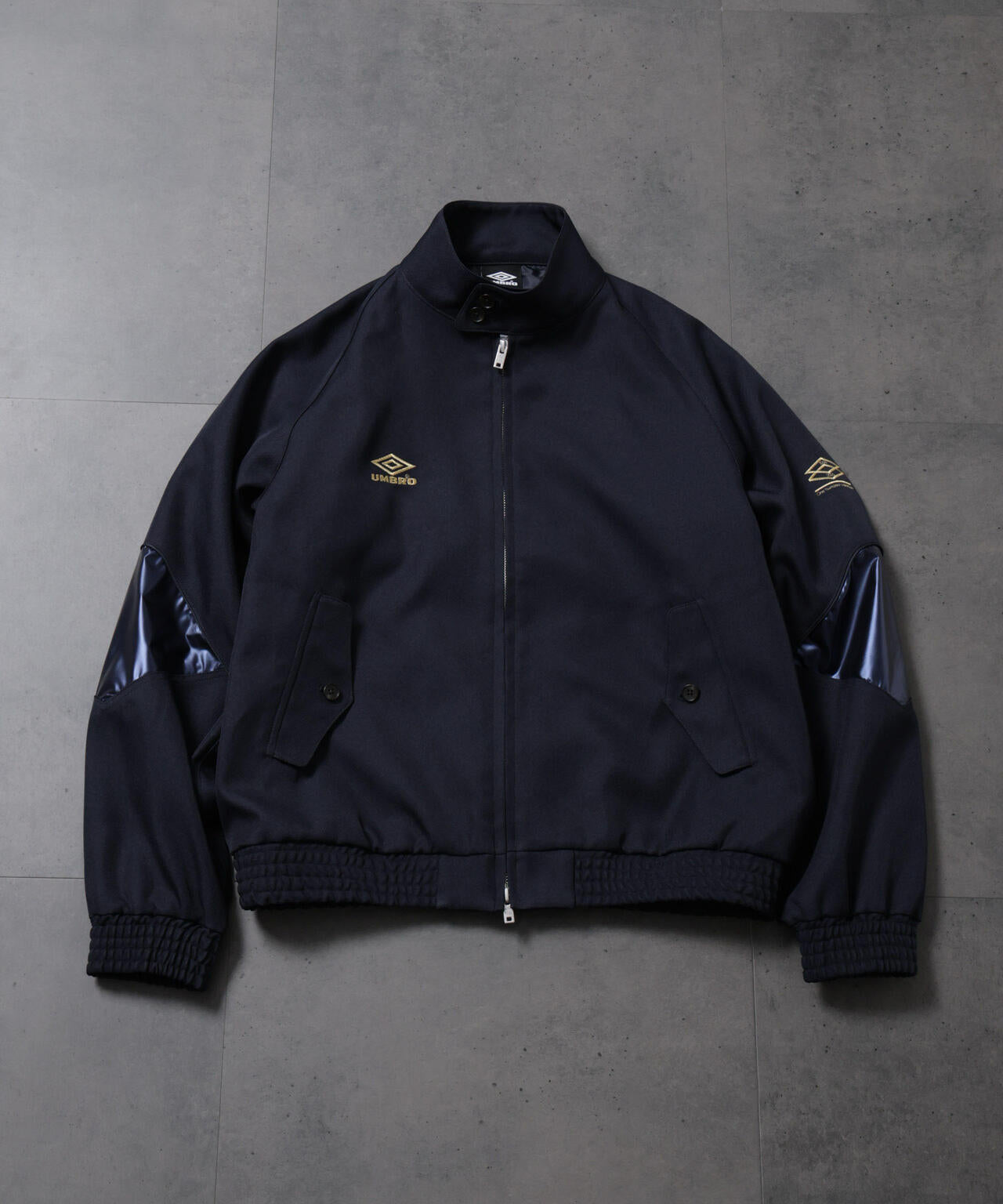 HOTEL PALACE(オテルパラス)xアンブロ シャイニーツイルハリントン