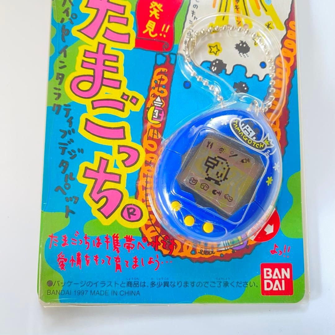 新種発見!! たまごっち 紺色 動作確認済み - メルカリ