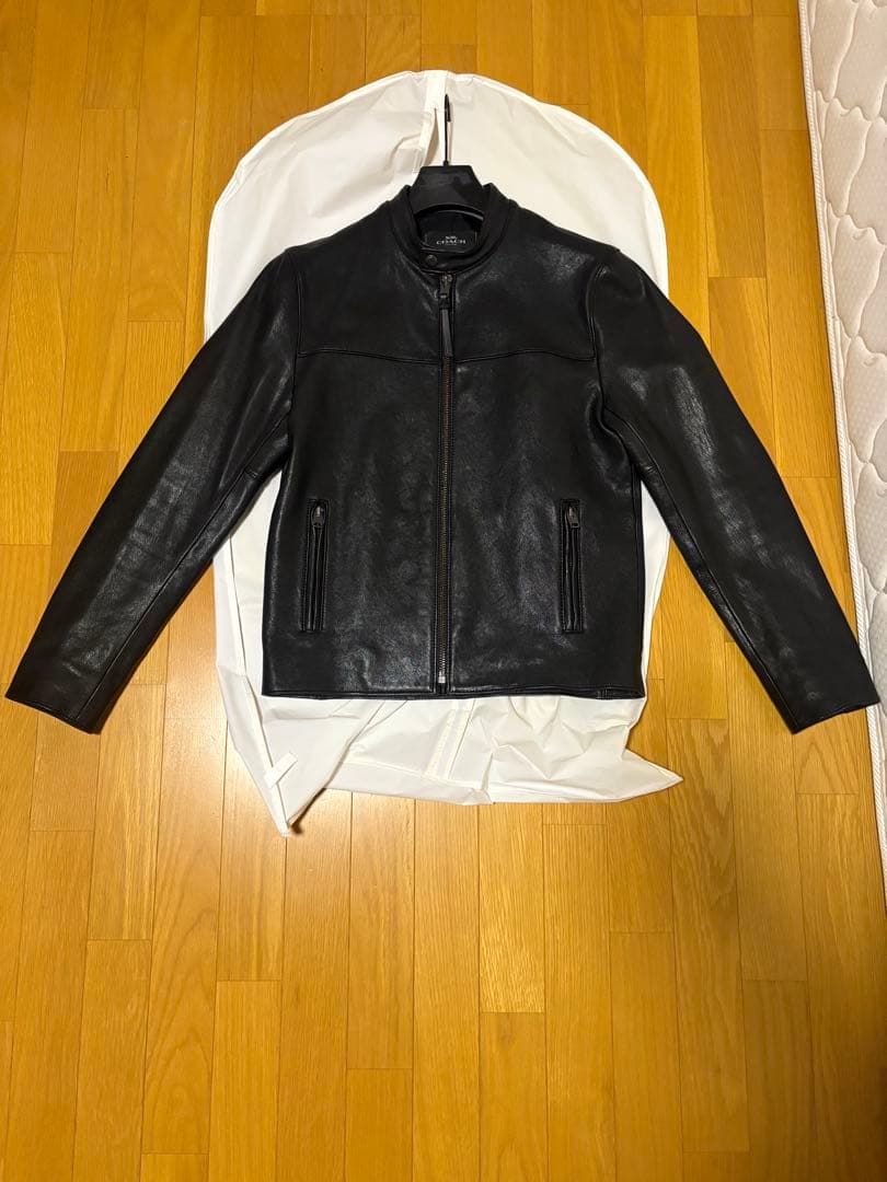 ブラックレザージャケット COACH保管袋付き 中古・古着通販】COACH (コーチ) レザー トラッカー ジャケット