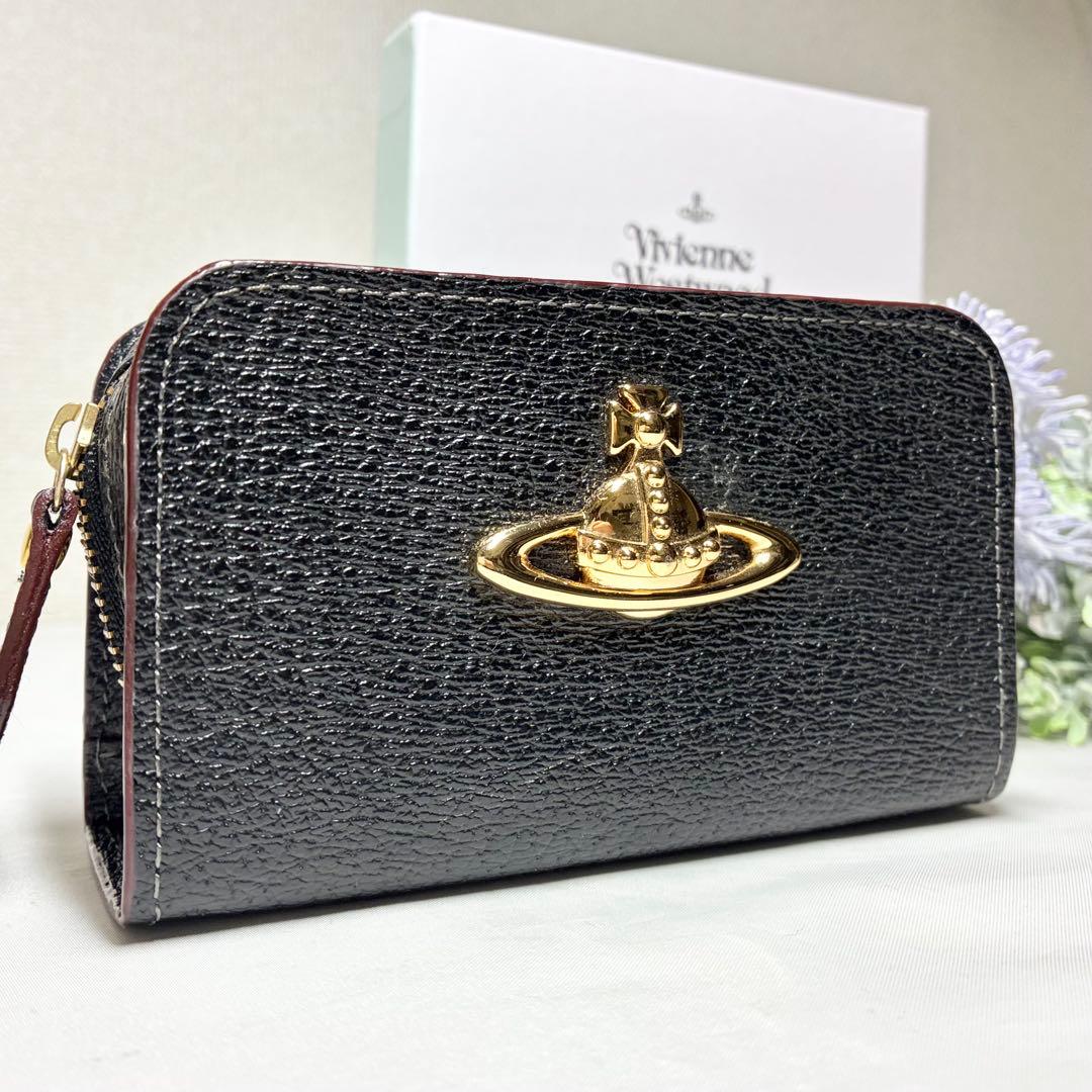 新品】 ヴィヴィアンウエストウッド マルチケース ポーチ オールレザー