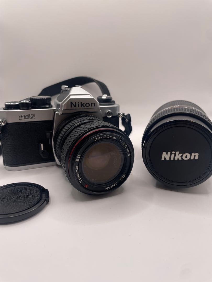 Nikon FM2 一眼レフカメラTokinaレンズ Nikonレンズ付き Nikon (ニコン) FM2 ブラック フィルムカメラ 一眼レフ – にっしん