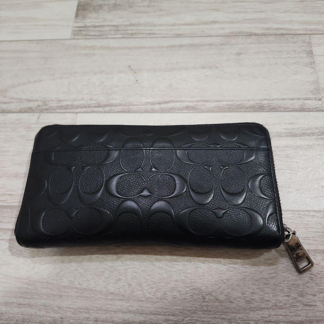 COACH エンボス加工 ブラック長財布 - メルカリ