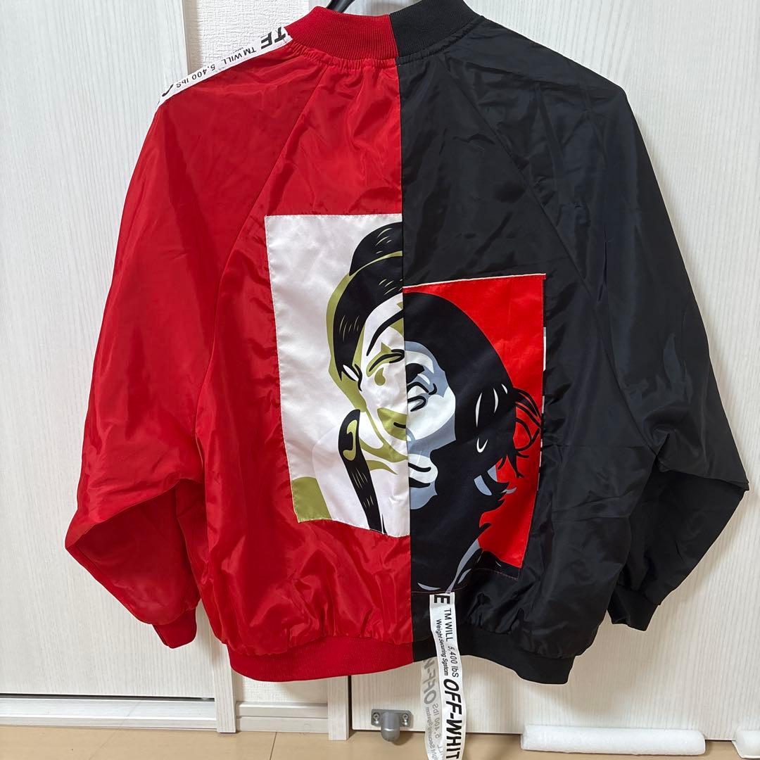 アートプリント付き赤黒ジャンパー - メルカリ