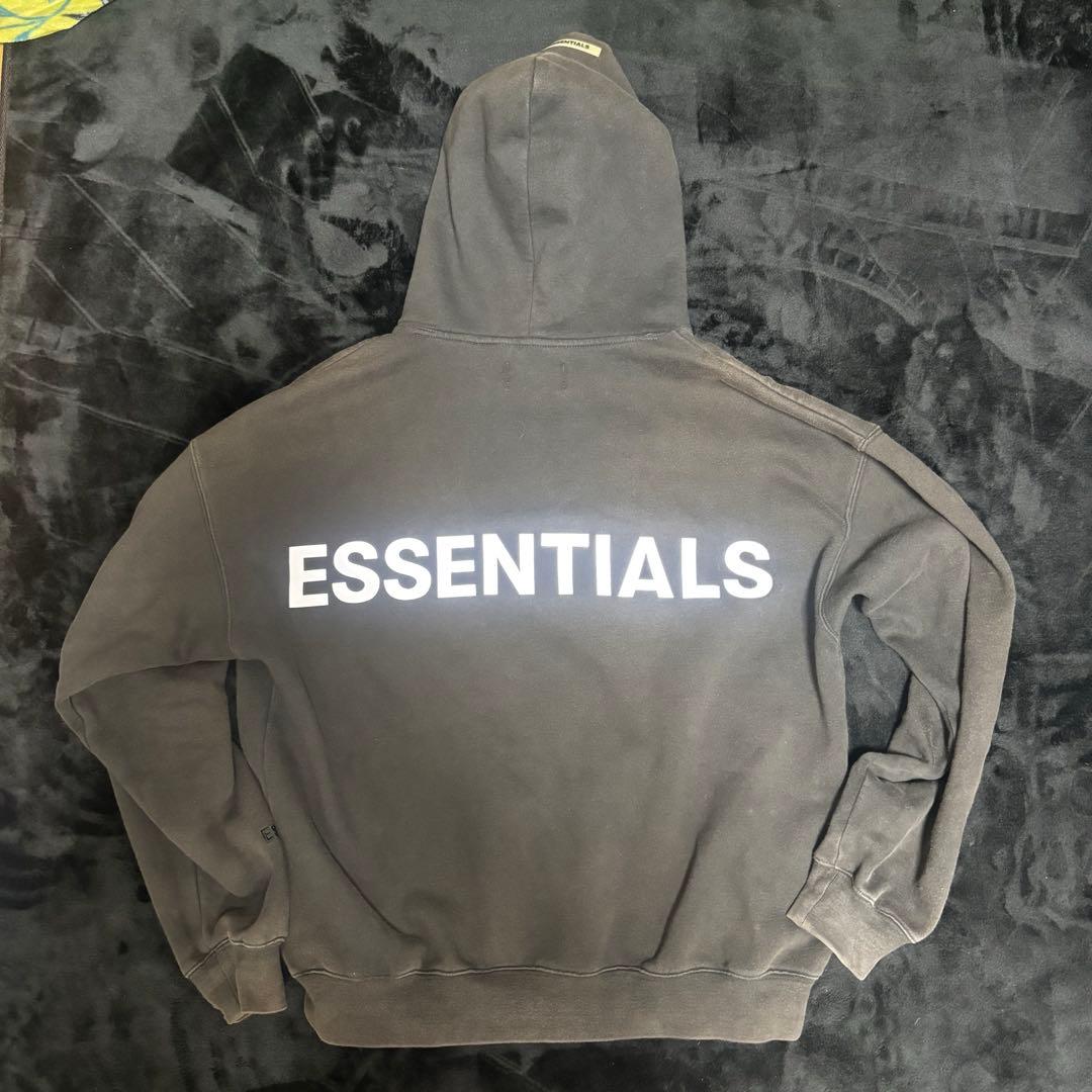 ESSENTIALS フード付きパーカー グレー - メルカリ
